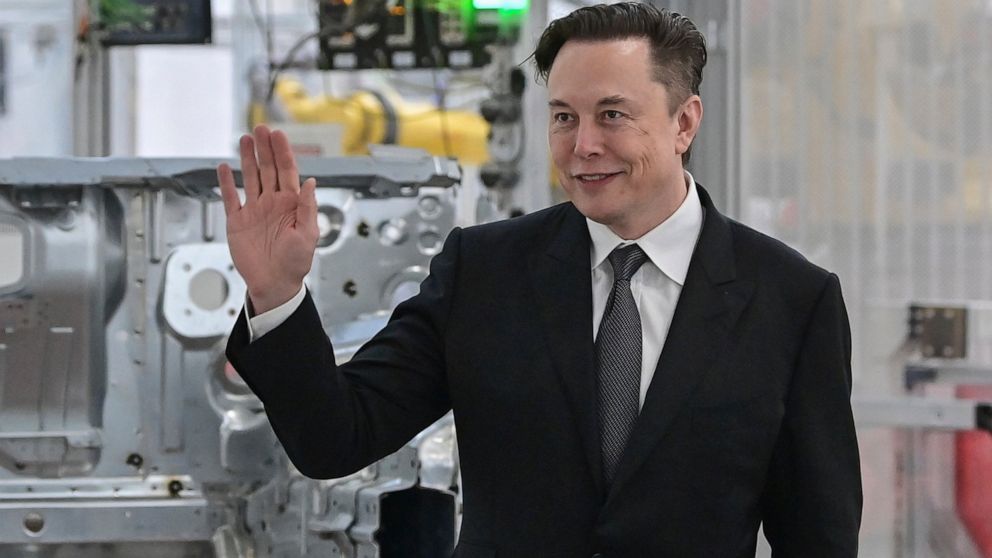 FILE - Tesla CEO Elon Musk attends the opening of the Tesla factory Berlin Brandenburg in Gruenheide, Germany, Tuesday, March 22, 2022. Musk has used Twitter to announce he had met with Pope Francis. Musk used the @Pontifex handle in tweeting that he