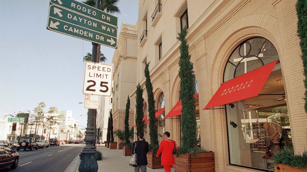 FILE - In a Jan. 11, 1996 file photo, pedestrians pass by upscale clothier Barneyís, Inc., in Beverly Hills, Calif. Luxury retailer Barneys New York may soon join the ever lengthening list of retailers seeking protection in bankruptcy. (AP Photo/Nick