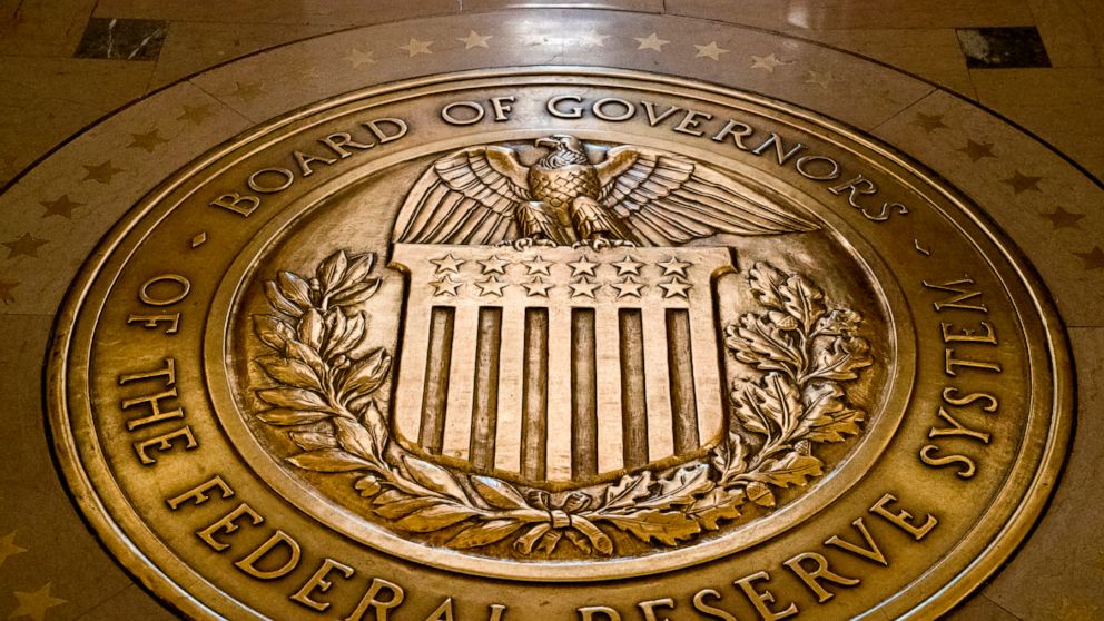 FILE- In this Feb. 5, 2018, file photo, the seal of the Board of Governors of the United States Federal Reserve System is displayed in the ground at the Marriner S. Eccles Federal Reserve Board Building in Washington. On Thursday, Sept. 12, 2019, the