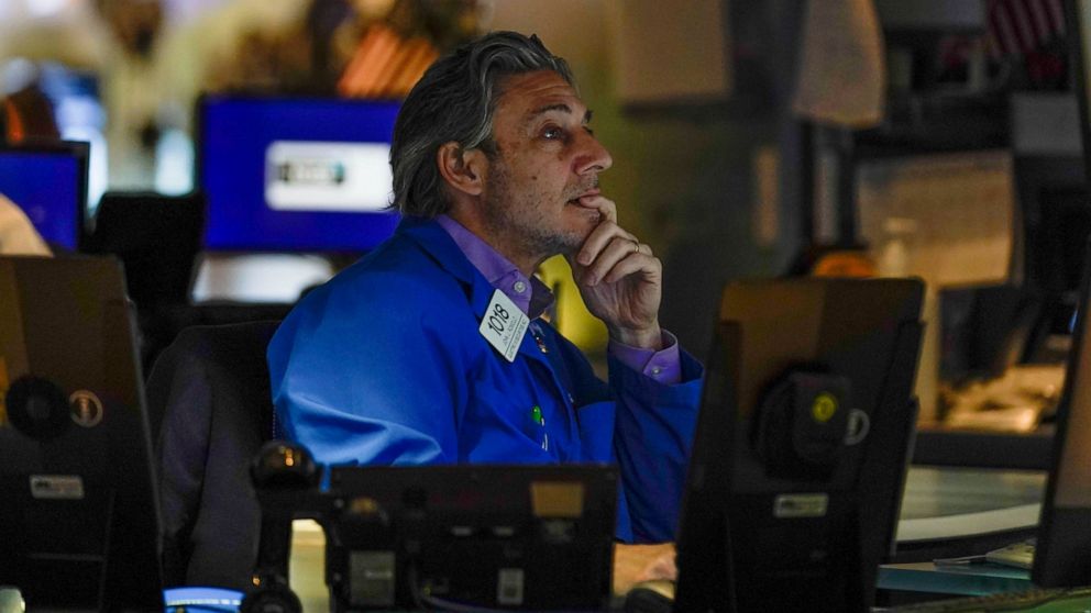 A trader works on the floor at the New York Stock Exchange in New York, Thursday, May 19, 2022. Stocks fell in morning trading on Wall Street Thursday, deepening a slump for major indexes as persistently high inflation continues to weigh on the econo