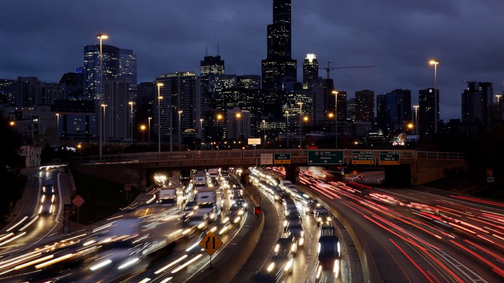 FILE - In this Nov. 21, 2018, file photo taken with a long exposure, traffic streaks across the John F. Kennedy Expressway at the start of the Thanksgiving holiday weekend in Chicago. The Transportation Security Administration said Wednesday, Nov. 13