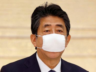 Japan OK's funds for $1.1 T stimulus to fight pandemic woes