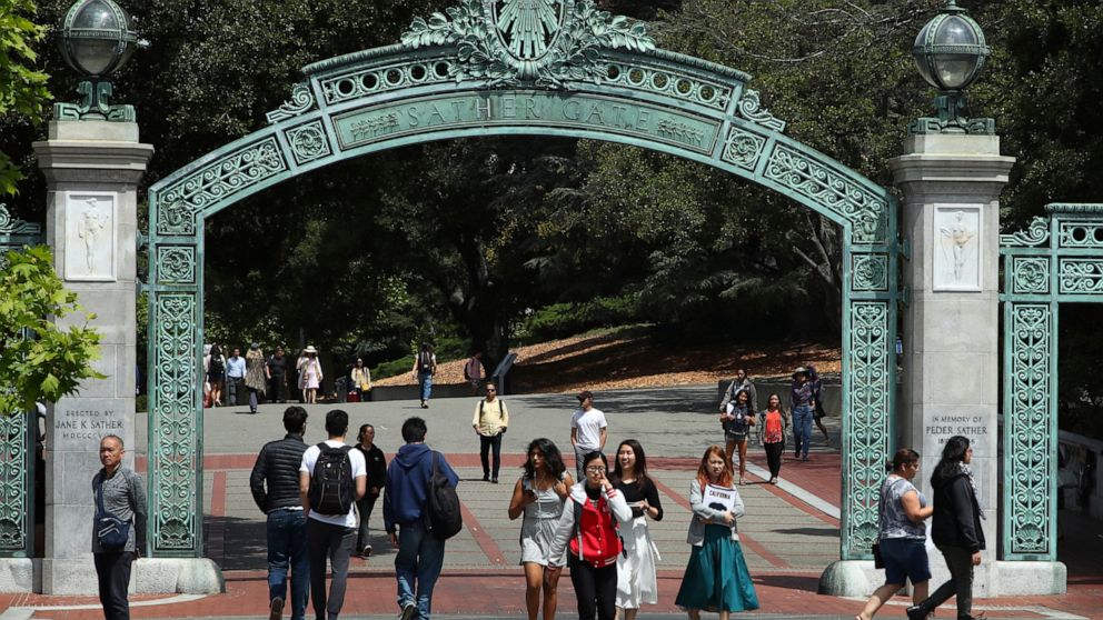 FILE - Students walk past Sather Gate on the University of California at Berkeley campus on May 10, 2018, in Berkeley, Calif. President Joe Biden's student loan forgiveness plan, announced in Aug. 2022, could lift crushing debt burdens from millions 