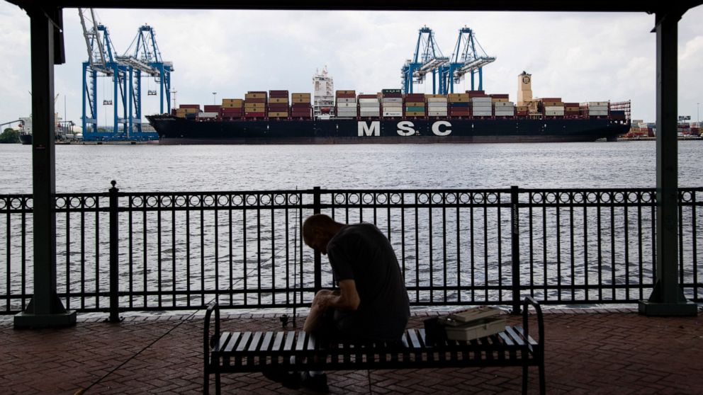 FILE - This June 18, 2019, file photo shows a container ship on the Delaware River in Philadelphia. The Trump administration blasted a World Trade Organization decision Tuesday, July 16, that could let China levy sanctions on the United States. (AP P
