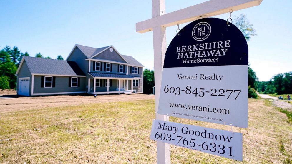 A real estate sign is posted in front of a newly constructed single family home, Thursday, June 24, 2021 in Auburn, N.H. U.S. home prices soared in April at the fastest pace since 2005 as Americans bid up prices on a limited supply of available prope