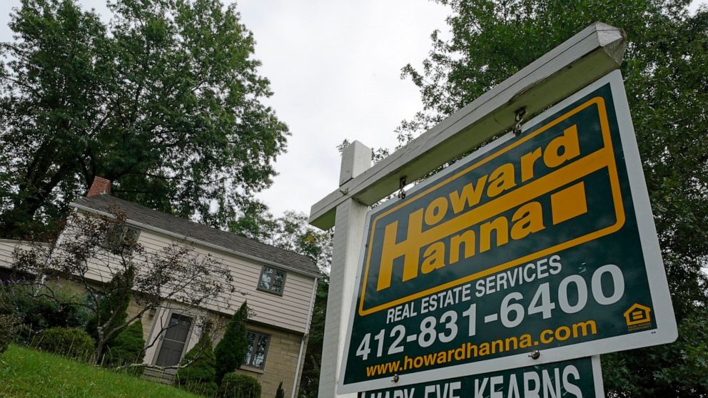 This is a home for sale in Mount Lebanon, Pa., on Tuesday, Sept. 21, 2021. U.S. mortgage rates were mixed this week, Thursday, Nov. 24. The average rate on the benchmark 30-year, fixed rate home loan was unchanged from last week at 3.1%; a year ago, 