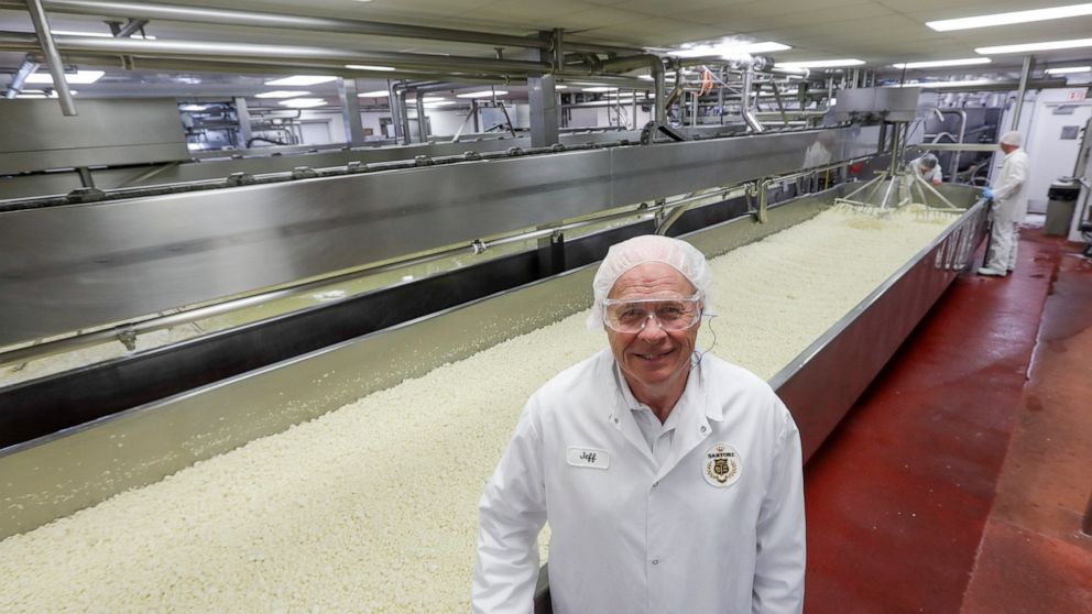 In this June 7, 2019, photo Jeff Schwager , president of Sartori Cheese poses for a picture at their plant in Plymouth, Wis. Schwager’s company, Sartori, faced retaliatory tariffs as President Donald Trump reopened a trade battle with Mexico to press