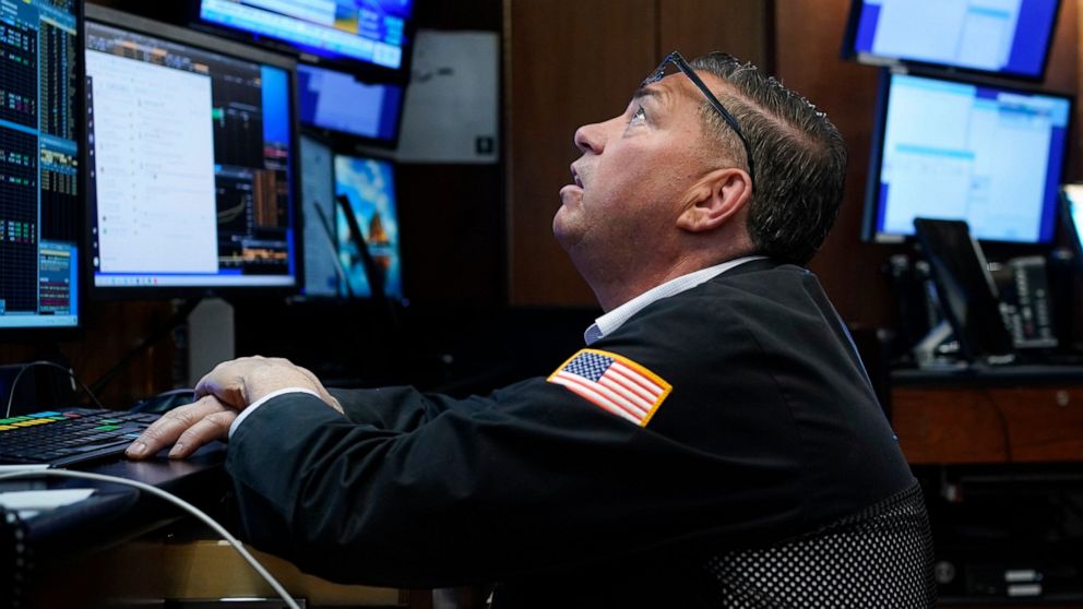 A Trader works on the floor at the New York Stock Exchange in New York, Thursday, Dec. 29, 2022. Stocks are opening higher on Wall Street Thursday in a broad rally led by the IT and communications sectors. (AP Photo/Seth Wenig)
