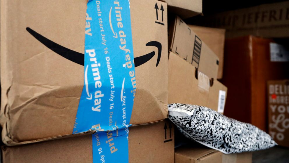FILE - In this July 17, 2018, file photo Amazon Prime packages sit in an UPS delivery truck before being unloaded in Miami. Amazon’s “Prime Day” is back. The made-up holiday, first launched in 2015, has become one of Amazon’s busiest shopping days, o