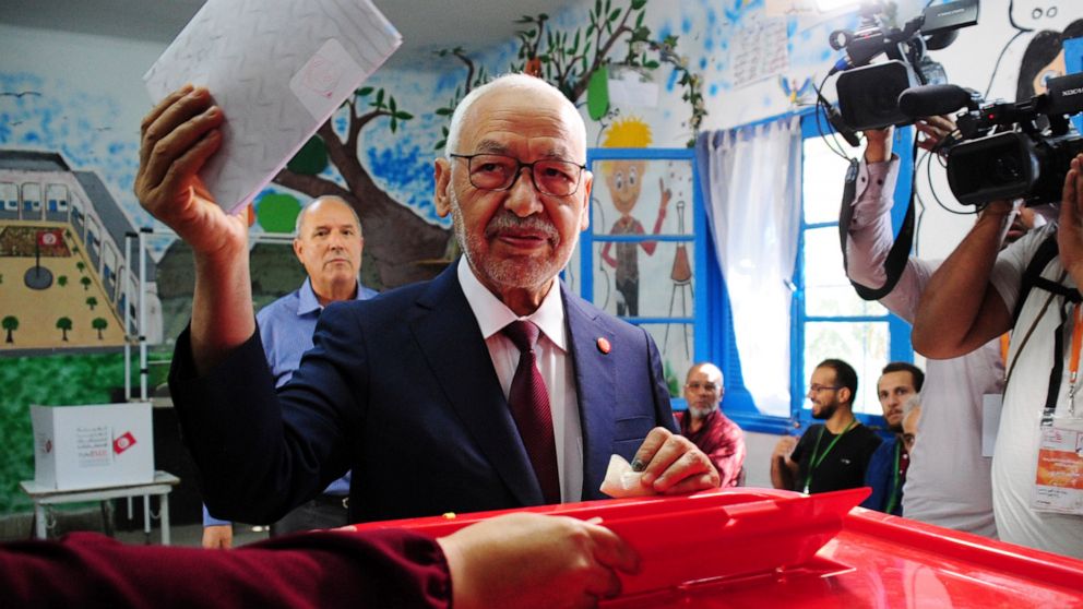 President of the Islamist party Ennahda and candidate for the Parliamentary election Rached Ghannouchi votes in a polling station south of Tunis, Tunisia, Sunday, Oct. 6, 2019. Tunisians are electing a new parliament Sunday amid a tumultuous politica