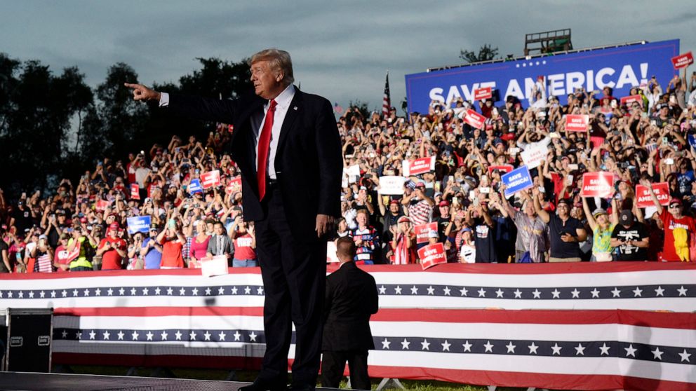 Former President Donald Trump walks on stage during a rally at the Sarasota Fairgrounds Saturday, July 3, 2021, in Sarasota, Fla. (AP Photo/Jason Behnken)