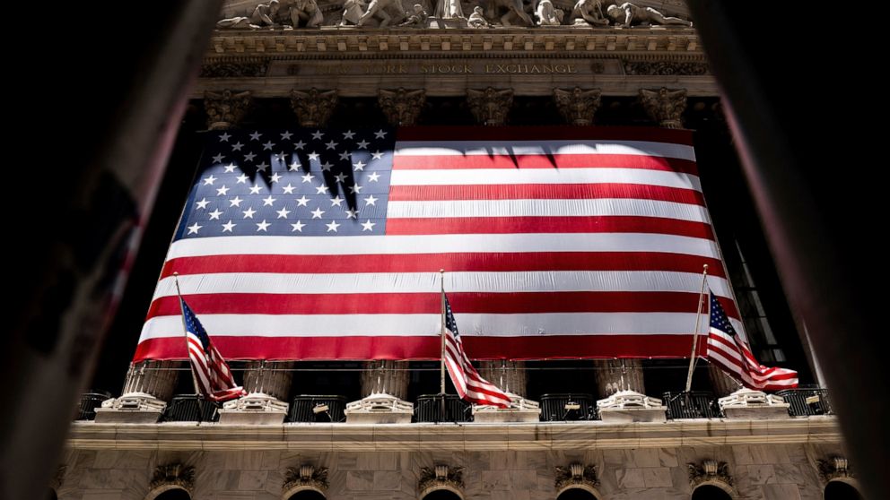 The American flag is shown at the New York Stock Exchange on Wednesday, June 29, 2022 in New York. Stocks shifted between gains and losses on Wall Street Wednesday, keeping the market on track for its fourth monthly loss this year. (AP Photo/Julia Ni