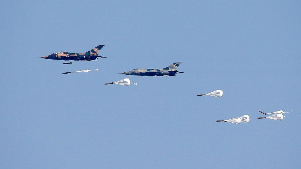FILE - Myanmar Air Force Jet fighters drop bombs during military exercises Friday, Feb. 2, 2018, in Ayeyarwaddy delta region, Myanmar. In a report released Thursday, Nov. 3, 2022, Amnesty International is urging suppliers of aviation fuel to Myanmar 