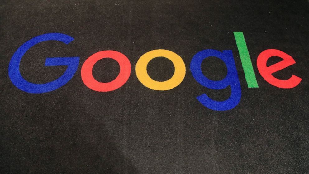 FILE - In this Monday, Nov. 18, 2019, file photo, the logo of Google is displayed on a carpet at the entrance hall of Google France in Paris. South Korea’s competition watchdog says it plans to fine Google at least 207.4 billion won ($177 million) fo