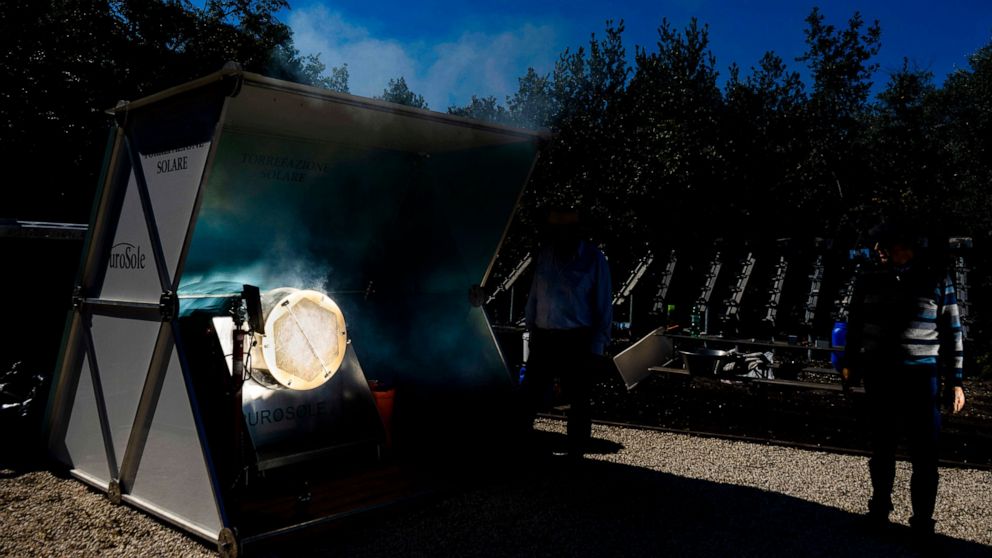 AP PHOTOS: Roasting coffee with the rays of the sun