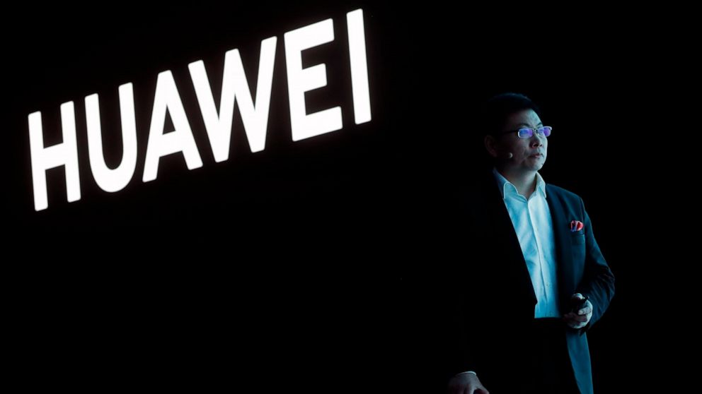 FILE - In this March 26, 2019, file photo, Huawei CEO Richard Yu stands during the presentation of the new Huawei P30 smartphone, in Paris. Chinese tech giant Huawei said Monday, April 22, 2019, its revenue rose 39 percent over a year earlier in the 
