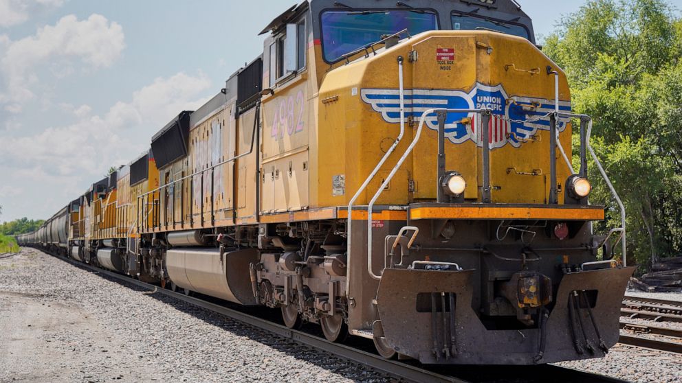 FILE - In this July 31, 2018, file photo a Union Pacific train travels through Union, Neb. Union Pacific Corp. reports earnings Thursday, July 18, 2019. (AP Photo/Nati Harnik, File)