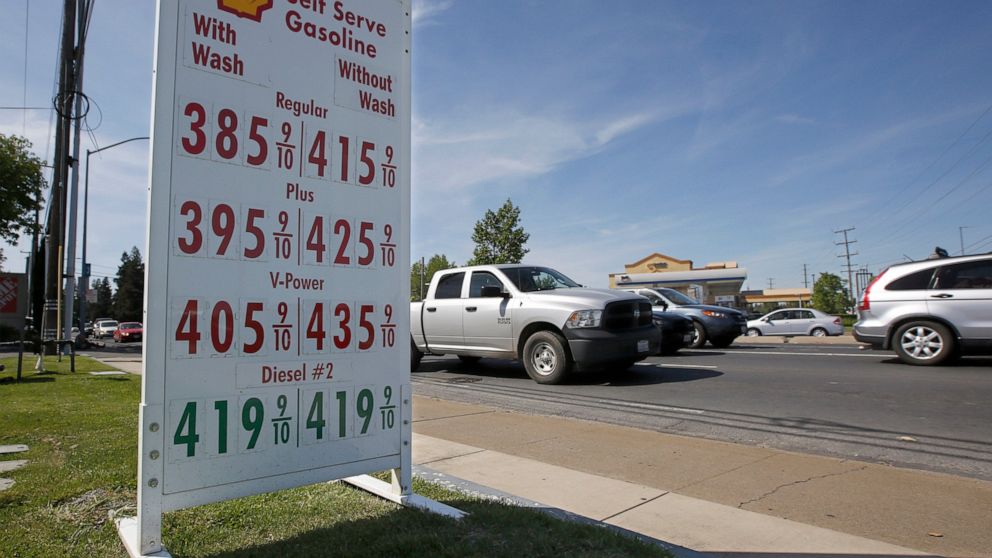 FILE - This April 23, 2019 file photo shows gas prices are displayed at a Shell station in Sacramento, Calif. Four major automakers have reached a secret deal with California to increase gas mileage and greenhouse gas emissions standards, bypassing t
