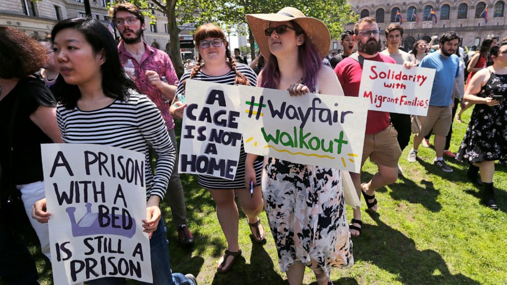 Employees of Wayfair march to Copley Square in protest prior to their rally in Boston, Wednesday, June 26, 2019. Employees at online home furnishings retailer Wayfair walked out of work to protest the company's decision to sell $200,000 worth of furn