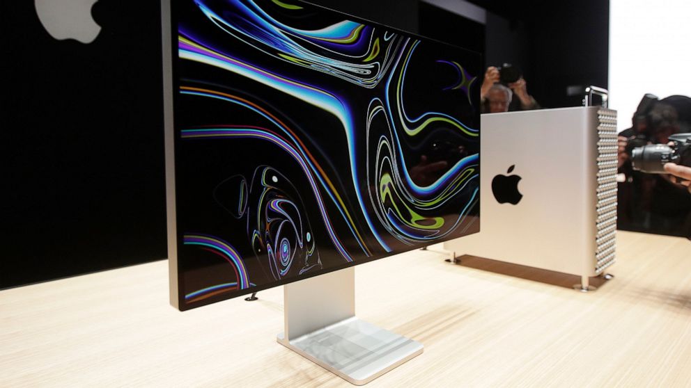 FILE - In this June 3, 2019, file photo a monitor of the Mac Pro is shown in the display room at the Apple Worldwide Developers Conference in San Jose, Calif. President Donald Trump is vowing to slap tariffs on Apple’s Mac Pros if the company shifts 