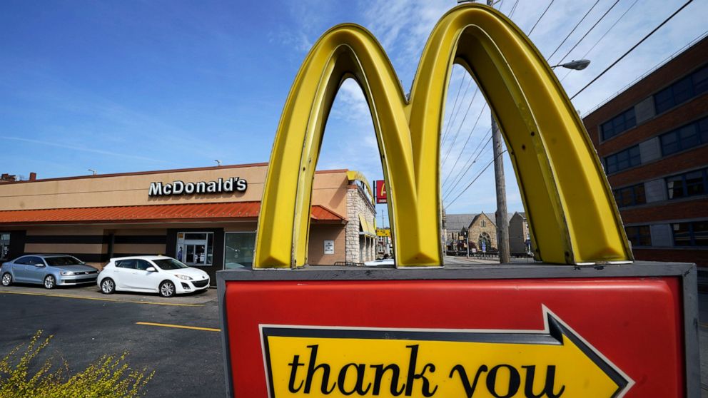 A sign is shown in front of an McDonald's restaurant in Pittsburgh on Saturday, April 23, 2022. The Chicago-based company said, Tuesday, July 26, it had net income of $1.60 per share. Earnings, adjusted for non-recurring costs, came to $2.55 per shar