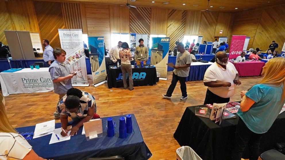 FILE - Veterans, the formerly incarcerated, and job seekers wanting to change professions, were invited to attend the 2022 Mississippi Re-Entry Job Fair in Jackson, Miss., on June 22, 2022. Applications for jobless aid for the week ending July 9 rose