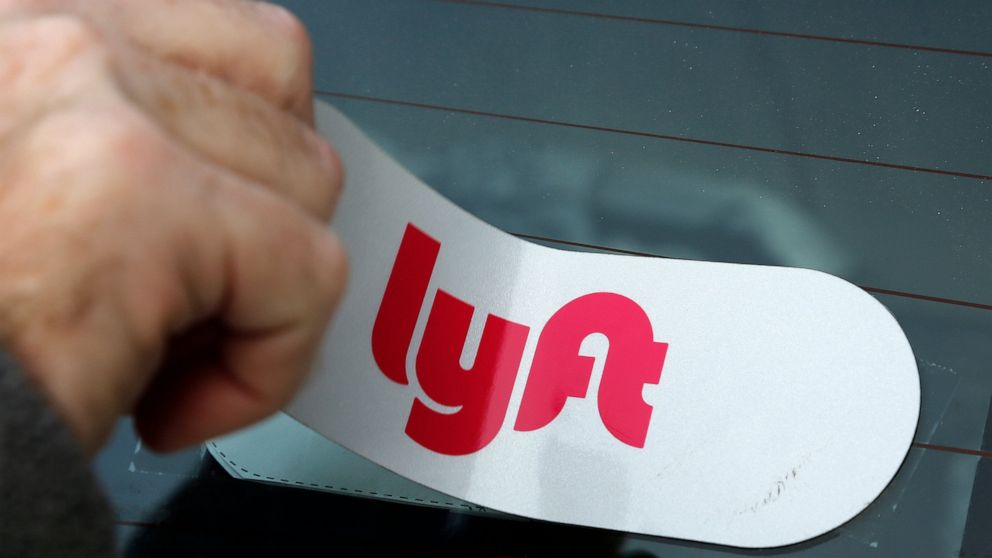 FILE - In this Jan. 31, 2018, file photo, a Lyft logo is installed on a Lyft driver's car in Pittsburgh. Lyft’s stock fell 10 percent in trading Monday, April 1, 2019, just one day after the company went public. (AP Photo/Gene J. Puskar, File)