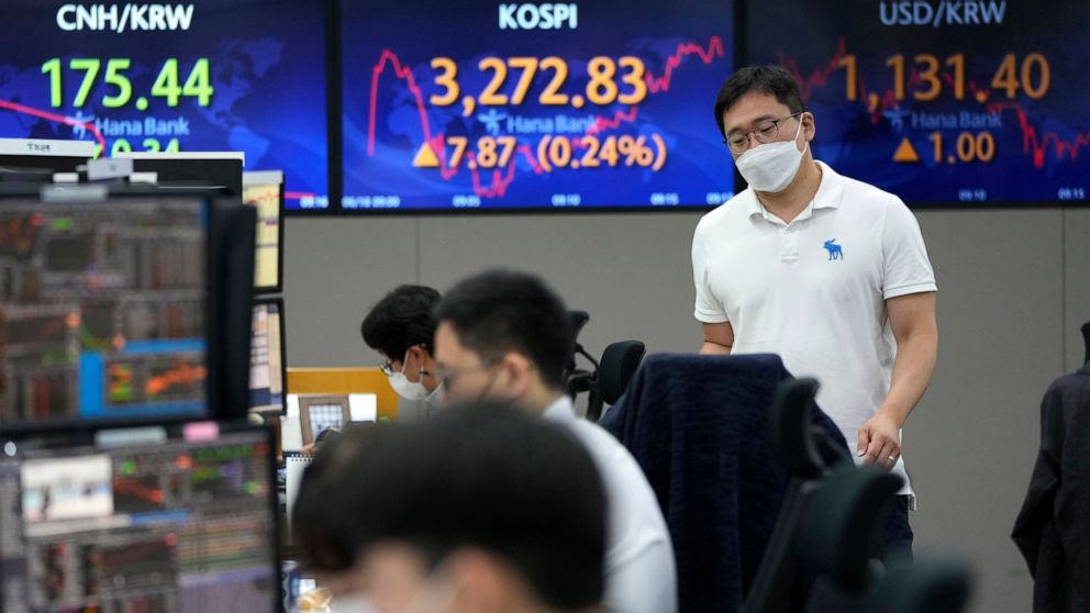 Asian shares mostly rise as markets digest Fed moves