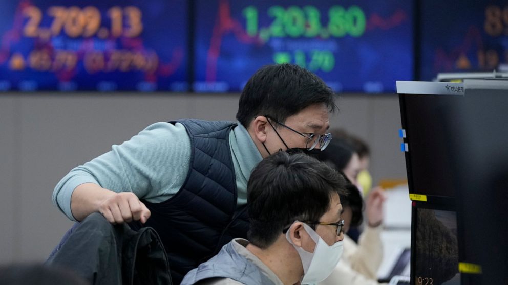 Asian shares mixed as earnings fuel gains on Wall Street