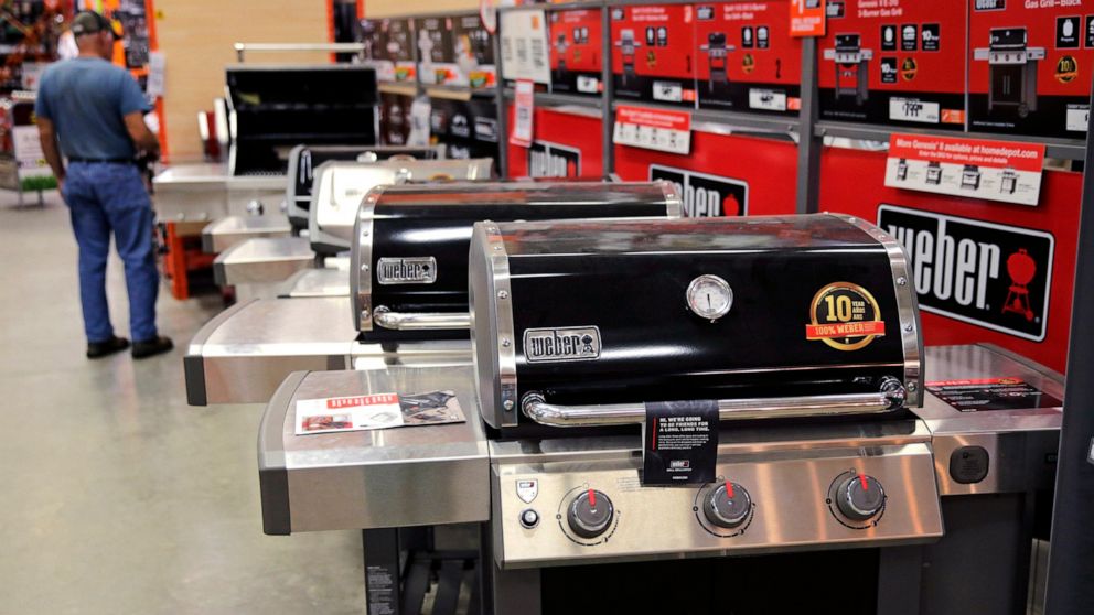 In this July 11, 2019, photo Weber grills are displayed at the Home Depot store in Londonderry, N.H. On Thursday, July 25, the Commerce Department releases its June report on durable goods. (AP Photo/Charles Krupa)