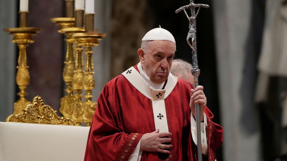 FILE - In this Tuesday, June 29, 2021 file photo, Pope Francis celebrates Mass during the Solemnity of Saints Peter and Paul, in St. Peter's Basilica at the Vatican. The Vatican's criminal tribunal on Saturday, July 3, 2021 indicted 10 people, includ