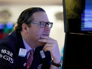 Markets Right Now: Stocks open slightly lower as banks slide