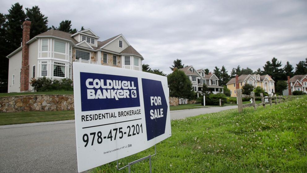 FILE - In this July 22, 2019, photo a sign advertises a house is for sale in North Andover, Mass. On Thursday, Sept. 26, Freddie Mac reports on this week’s average U.S. mortgage rates. (AP Photo/Elise Amendola, File)