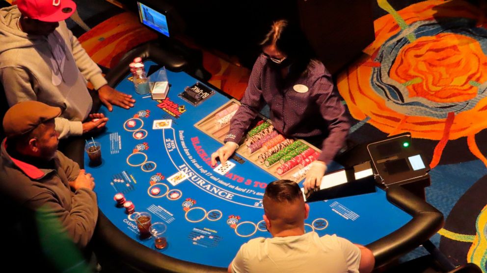 Gamblers playing cards at the Ocean Casino Resort in Atlantic City, N.J., on Feb. 10, 2022. Figures released by New Jersey gambling regulators on Friday, April 8, 2022, show that Atlantic City's casino earnings have surpassed the level they were at b