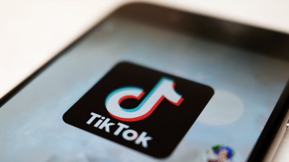 FILE - This Monday, Sept. 28, 2020, file photo, shows the TikTok logo on a smartphone in Tokyo. On Sunday, March 6, 2022, Netflix and TikTok suspended most of their services in Russia as the government cracks down on what people and media outlets can