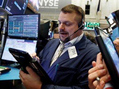 Markets Right Now: Stocks turn higher on strong earnings