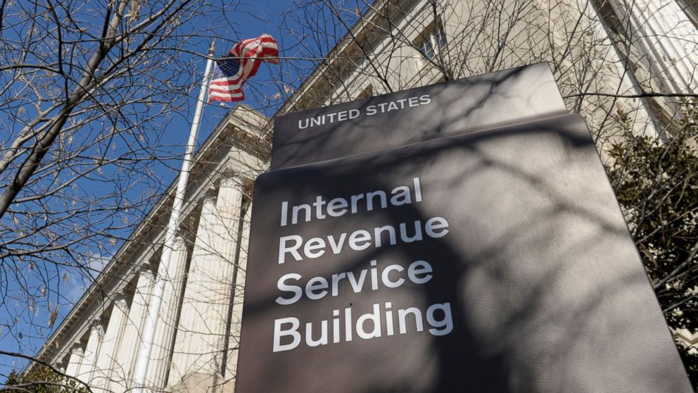 FILE - This March 22, 2013 file photo, shows the exterior of the Internal Revenue Service building in Washington. The Internal Revenue Service is recalling about 46,000 of its employees furloughed by the government shutdown, nearly 60 percent of its 