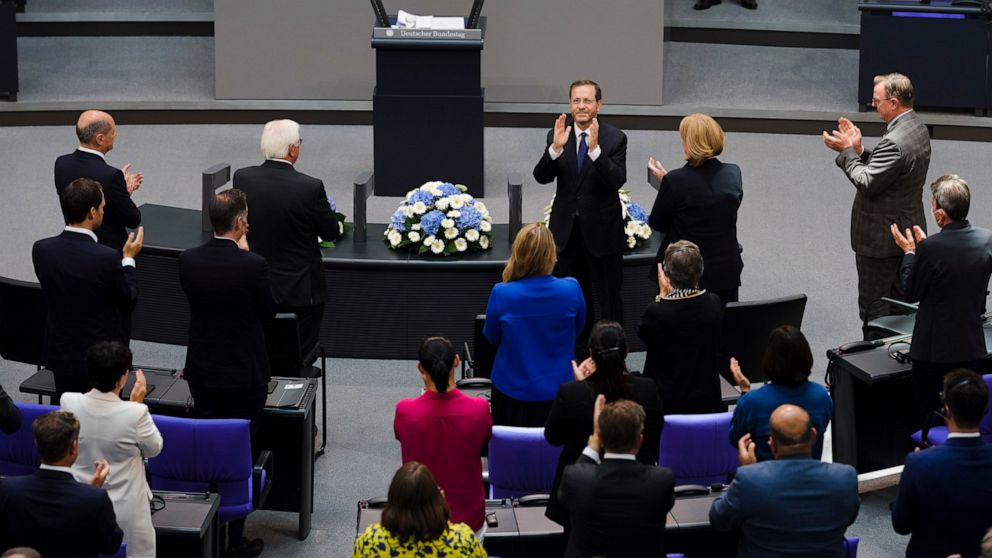 Israeli President Isaac Herzog receives standing ovations after his speech at the German parliament Bundestag at the Reichstag building in Berlin, Germany, Tuesday, Sept. 6, 2022. (AP Photo/Markus Schreiber)