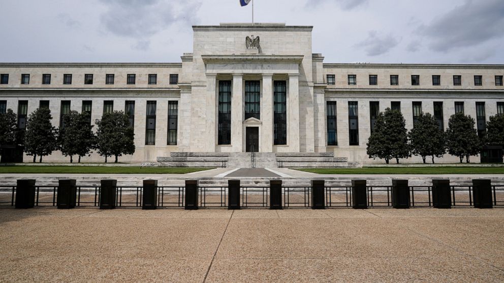 FILE - In this May 4, 2021, file photo is the Federal Reserve in Washington. The Federal Reserve's latest nationwide business survey found that the economy strengthened further in late May and early June, despite supply-chain bottlenecks that led to 