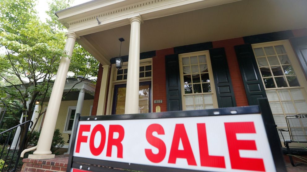 In this Aug. 16, 2019, photo a for sale signs beckon buyers to homes along Park Avenue in Richmond, Va. On Thursday, Aug. 22, Freddie Mac reports on this week’s average U.S. mortgage rates. (AP Photo/Steve Helber)