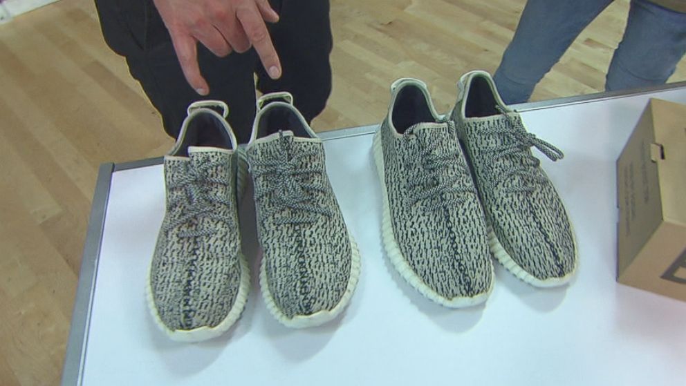 Yeezy Busta, an unofficial sneaker authenticator who wears a mask to hide his identity, says the pair of sneakers on the left is fake and the pair on the right is real.