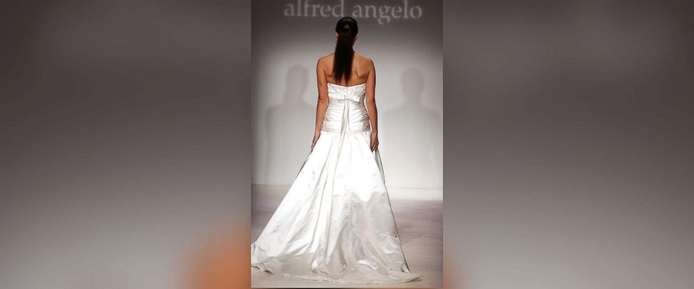PHOTO: A Model walks the runway at an Alfred Angelo show, April 8, 2011, in New York City.  