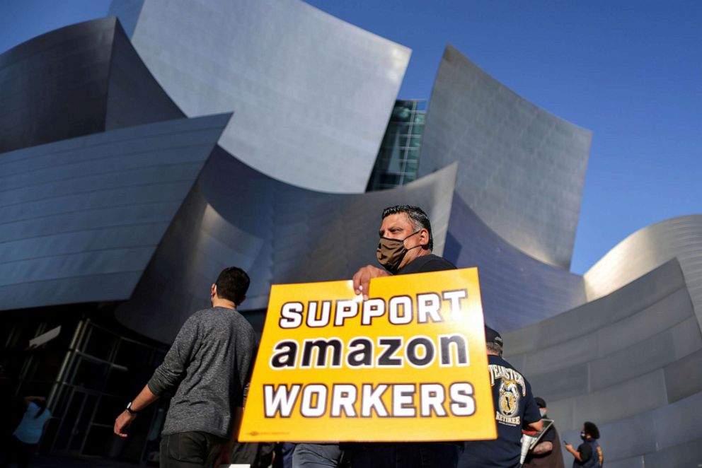 PHOTO: People protest in support of the unionizing efforts of the Alabama Amazon workers, in Los Angeles, March 22, 2021. 