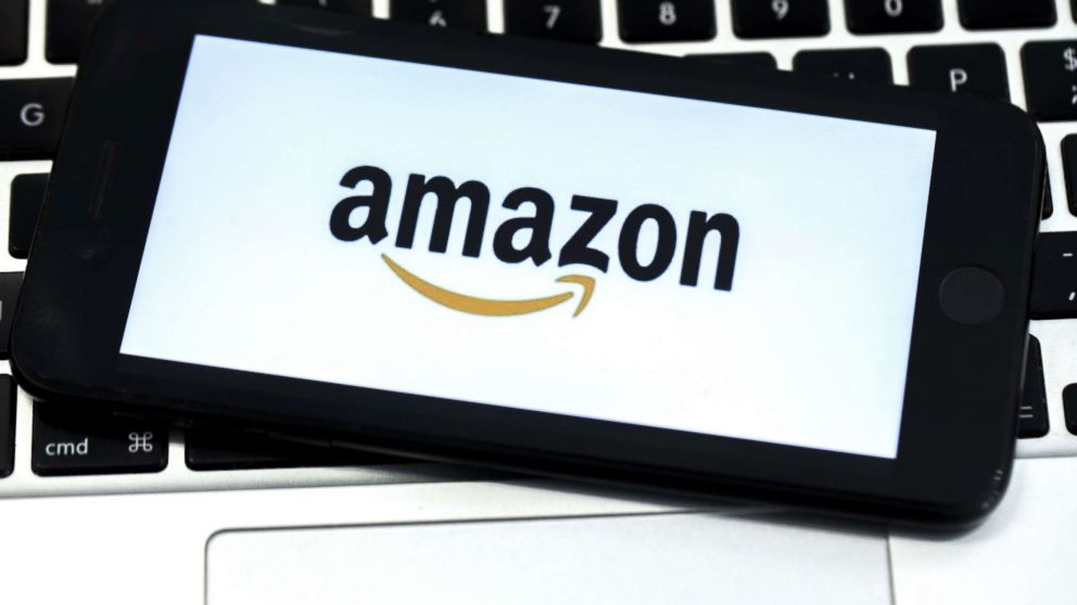 PHOTO: The Amazon logo is displayed on screen of a mobile photo in a stock photo. 