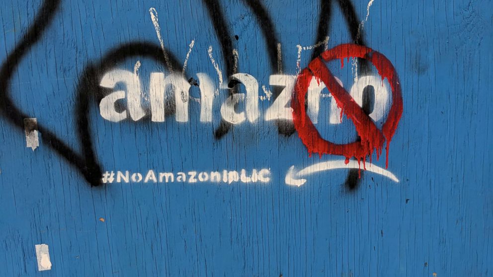 PHOTO: Graffiti opposing the construction of the new Amazon campus covers a fence at a vacant lot in the Long Island City neighborhood of New York, Dec. 5, 2018.