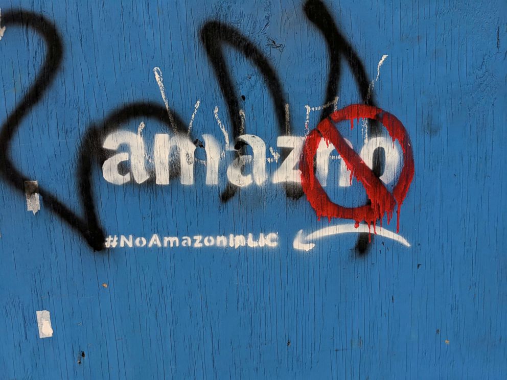 PHOTO: Graffiti opposing the construction of the new Amazon campus covers a fence at a vacant lot in the Long Island City neighborhood of New York, Dec. 5, 2018.