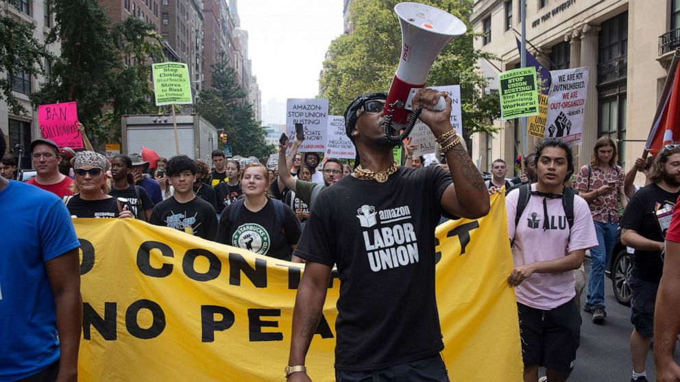 PHOTO: Chris Smalls, a leader of the Amazon Labor Union, leads a march of Starbucks and Amazon workers and their allies to the homes of their CEOs to protest union busting on Labor Day, Sept. 5, 2022, in New York City.