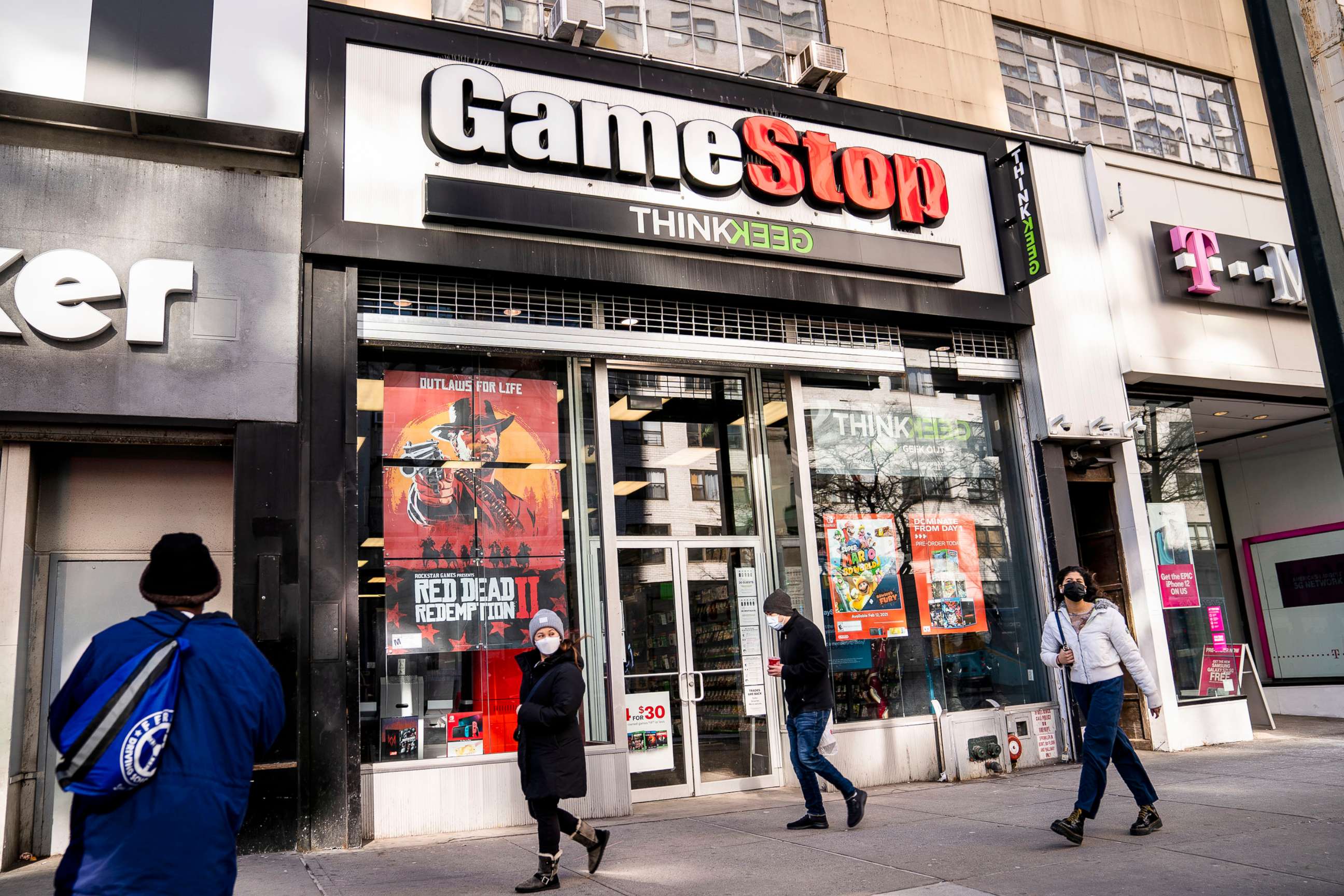 PHOTO: Pedestrians pass a GameStop store in New York City, Jan. 28, 2021.