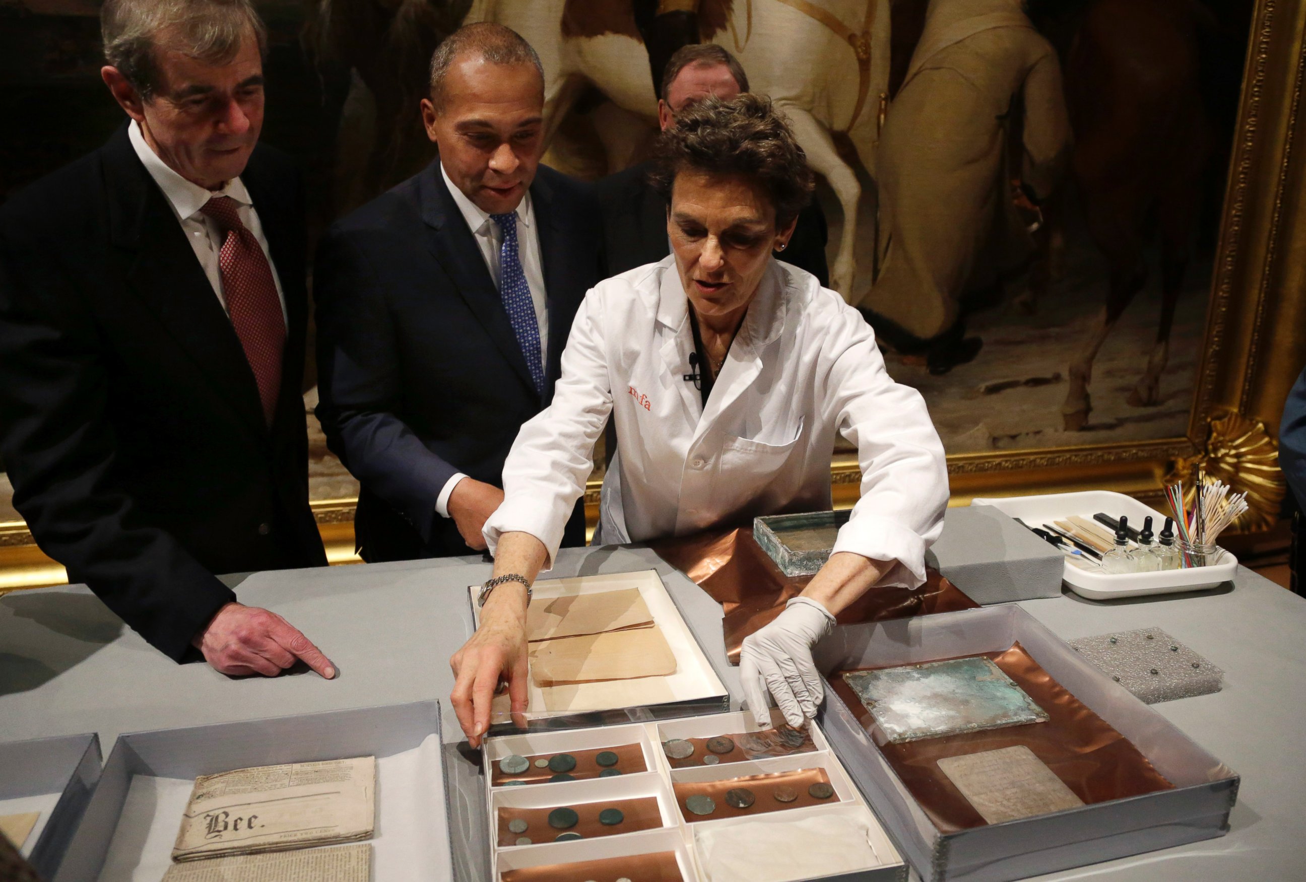 PHOTO: Museum of Fine Arts Boston Head of Objects Conservation Pam Hatchfield displays objects removed a time capsule