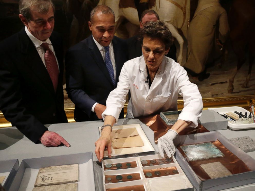 PHOTO: Museum of Fine Arts Boston Head of Objects Conservation Pam Hatchfield displays objects removed a time capsule
